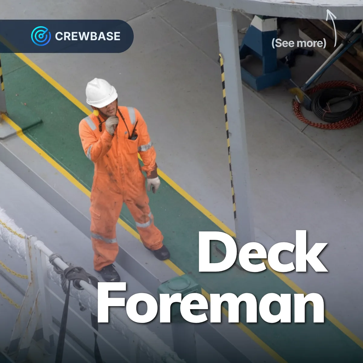 Deck foreman in orange coveralls white hard hat with radio on vessel green walkway CrewBase