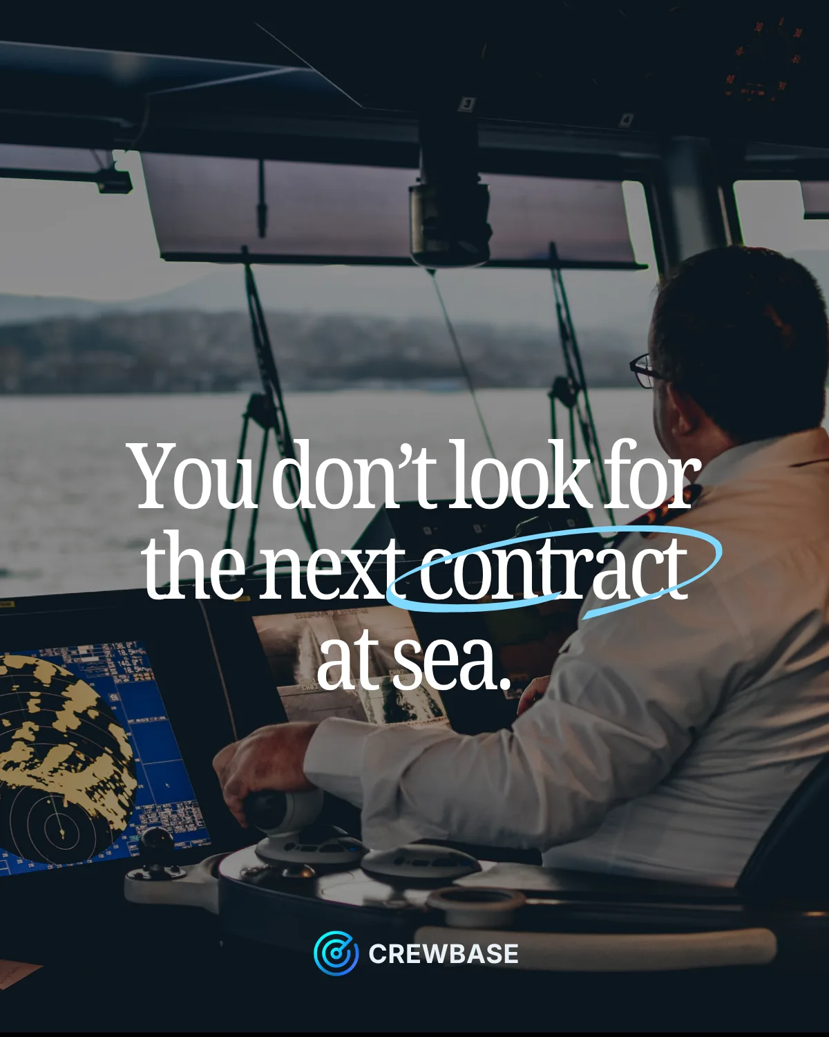 You don’t look for the next contract at sea — CrewBase does. Officer on the bridge at the radar.